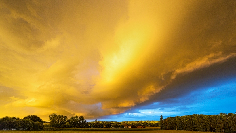 Storm front at sunset